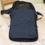 The Riutbag R15.3 backpack is almost like two bags, with a multi-pocketed sleeve-like section opening to reveal the main compartment.
